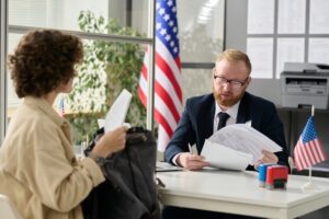 Denham lawyer discussing case with client