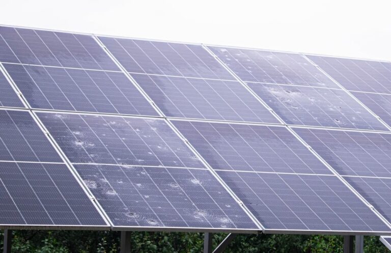 Solar panels with visible hail damage