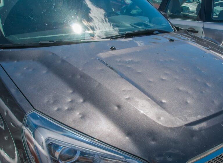 Dented car after a big hail storm
